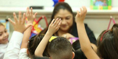 Hispanic teacher in a classroom