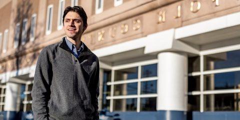 Matt DelSesto standing in front of the Suffolk County House of Correction